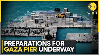 US troops begin construction of floating pier for humanitarian aid delivery in Gaza | WION News