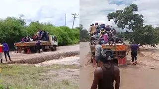 CHAOS AS LORRY FERRYING OVER 20 PEOPLE IS SWEPT AWAY BY A FLOODED RIVER IN SULTAN HAMUD!..W