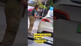 woman,trying to put petrol in a Tesla. #shots #travel #uk #youtube #london #shorts #short #viral