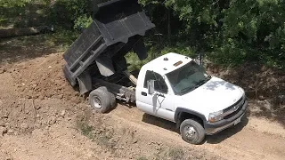 Chevy 3500 4WD Dump Truck Backing 4 tons of clay over Catwalk 05-11-18