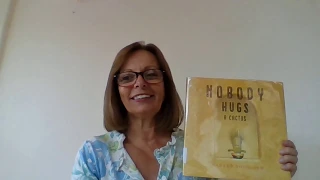 Mrs. Primm reads "Nobody Hugs a Cactus."