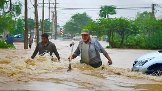 Epic Flash Flood Street Drain Unclogging Witness the Power of Nature!