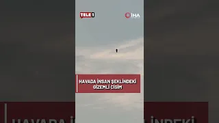 Havada insan benzeri uçan cisim herkesi şaşırttı