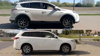 HYBRID 4x4: Toyota Rav4 vs Mitsubishi Outlander PHEV - test on rollers