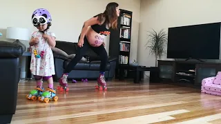 Pregnant Woman and Toddler dancing Thriller on Roller Skates