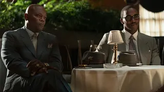 A black man is prevented from entering a bank, so he buys it and becomes the bank boss - moviereview