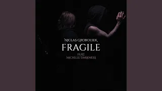 Fragile (feat. Michelle Darkness)