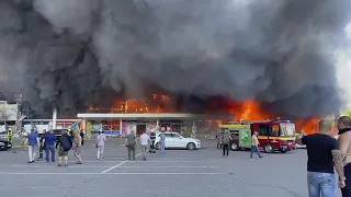 Russian missiles hit shopping centre in central Ukraine with more than 1,000 people inside