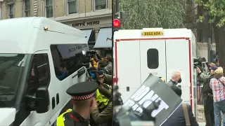 Police vans arrive to court as Assange extradition hearing resumes | AFP