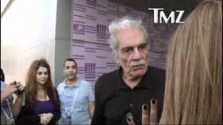 Arab Film Star Omar Sharif Slaps Woman on the Red Carpet