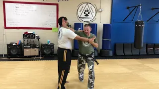 Single hand pluck choke defense