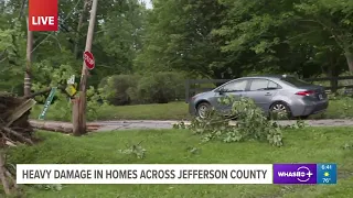 Car gets stuck trying to go around downed tree on live TV in Anchorage, KY