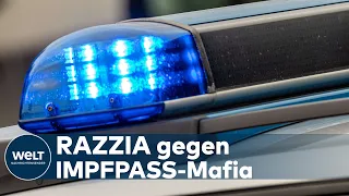 COVID-RAZZIA: Zwölf Festnahmen bei Schlag gegen Corona-Impfpass-Fälscher