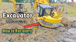 Cat 313CR Excavator Stuck in Mud Recovery by Cat 312. Extraordinary Work. Excavator