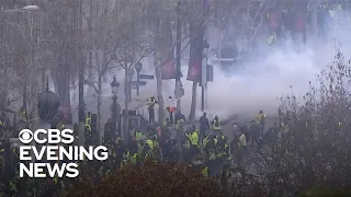 French police fire tear gas at protesters in Paris