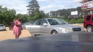 Epic girl fight!  Shocking woman pulls a knife with child watching over a loan rejection!