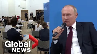 Putin tells schoolchildren that soldiers sent to Ukraine are to protect Russia