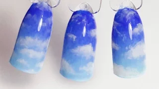 Nails design gel lacquer: The sky with clouds. The painting on the wet gel varnish