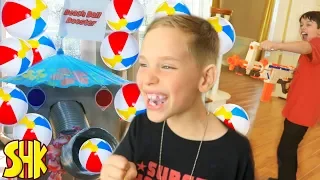 BEACH BALL BOOSTER SNEAK ATTACK! Nerf Blaster Battle w/ Ethan and Cole ExtremeToys TV
