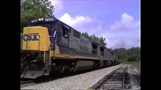 [Vintage CSX] CSX freight train struggles uphill.