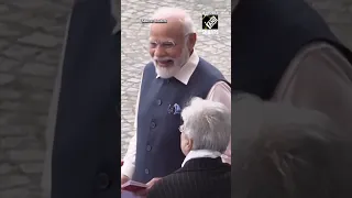 PM Modi and President Macron share a warm hug during Bastille Day Parade