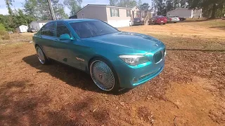 True Gritt Customs BMW 750 Li on 24 inch Dub Floaters paint job