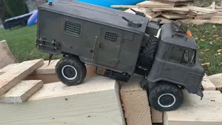 Cross RC-GC4M GAZ66 climbs over a parkour