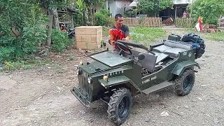 driver Rohendi..mobil rakitan mesin motor.. homemade..