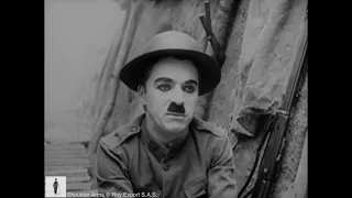 Charlie Chaplin in the trenches (Scene from Shoulder Arms, 1918)