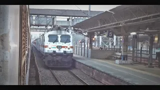 Aggressive Crossing!  WAP-7 displaying Top Class in front of an EMU!