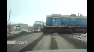 Kamaz truck and a diesel locomotive collided at a railway crossing in Karaganda (Kazakhstan).