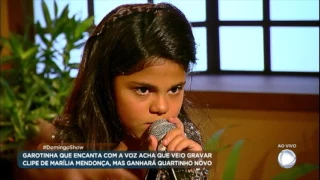 Menina cantora regrava clipe de Infiel, sucesso de Marília Mendonça