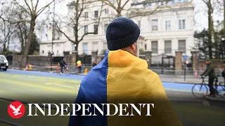 Four arrests after campaigners paint huge Ukrainian flag outside Russian embassy