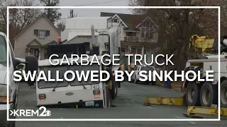 Sinkhole swallows Spokane garbage truck in Perry District