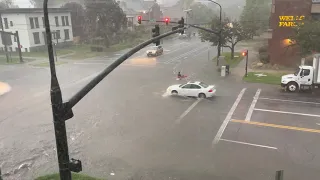 Salt Lake City Resident Kayaks Through Flooded Streets Amid Heavy Rain