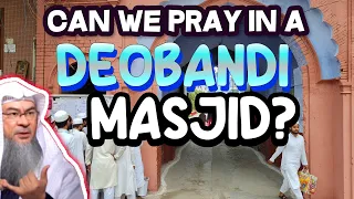 Can we pray in an intolerant Deobandi Masjid, passing in front of others while they are praying?