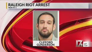 Man arrested on charge of inciting riot