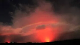 "GLOW"  (expansive time lapse of Kilauea volcano lava flow, sky, stars, moon) (2011)