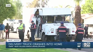 Delivery truck crashes into Tempe home