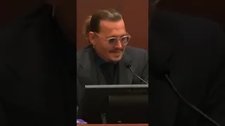 Johnny Depp and Amber’s Lawyer sharing a moment