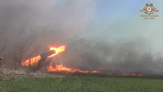 Russian TOS-1 incendiary/thermobaric multiple rocket launcher system firing at Ukrainian nationalist
