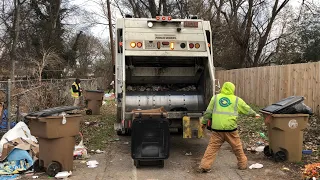 Pete Heil Rear Loader Garbage Truck Packing Messy Trash in Nashville Alleys