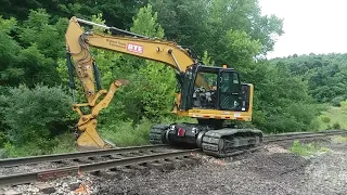 Hulcher Undercutting Track with Cat 325F