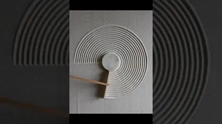 Satisfying japanese zen garden sand raking