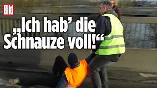 Klima-Kleber werden aus Asphalt geschnitten | Hamburg