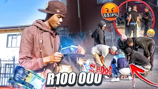 DROPPING R100000 CASH PRANK IN THE HOOD !! **GONE WRONG**