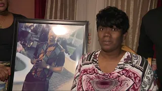 Mother mourning son that was shot and killed while holding his baby