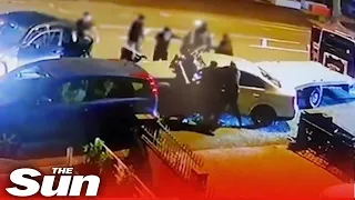 Massive gang of thugs smash up car with baseball bats in Birmingham