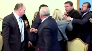 shocking video Ukrainian MP kicks security chief in the HEAD