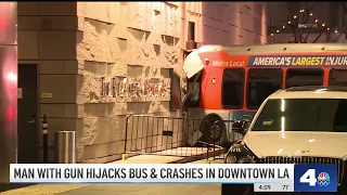 Armed man hijacks Metro bus and crashes into downtown LA hotel